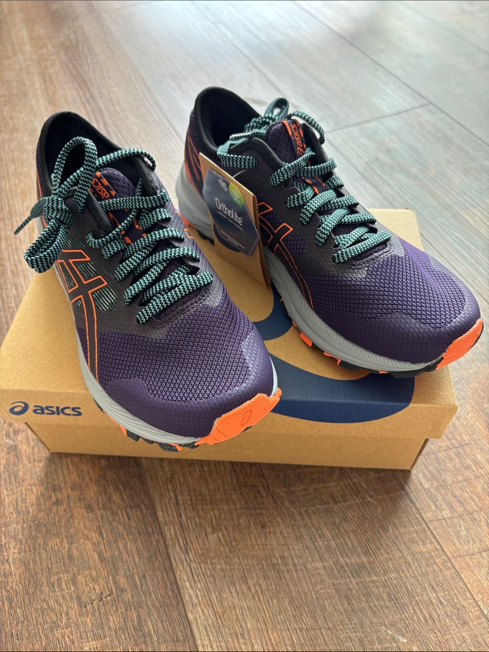 Asics Purple Running Shoes with Orange Accents and Green Laces